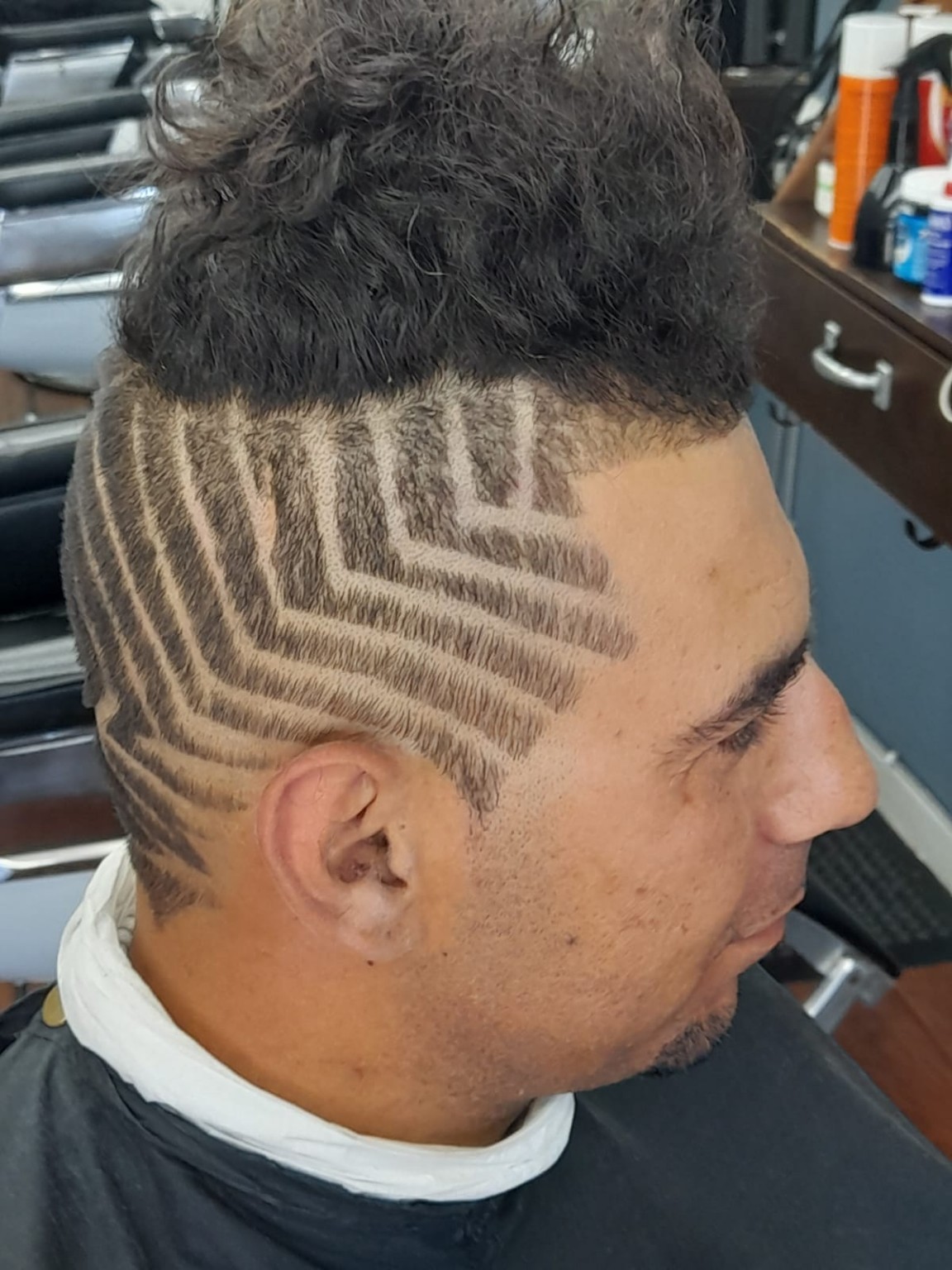 K. Stylz haircut design — side view