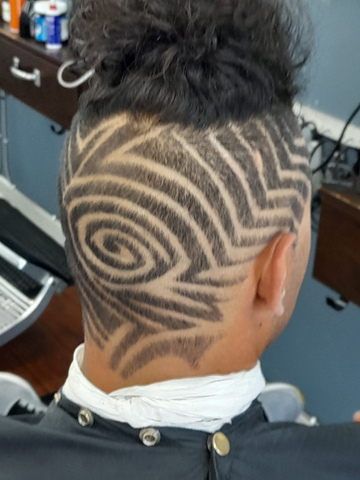 K. Stylz haircut design — back view