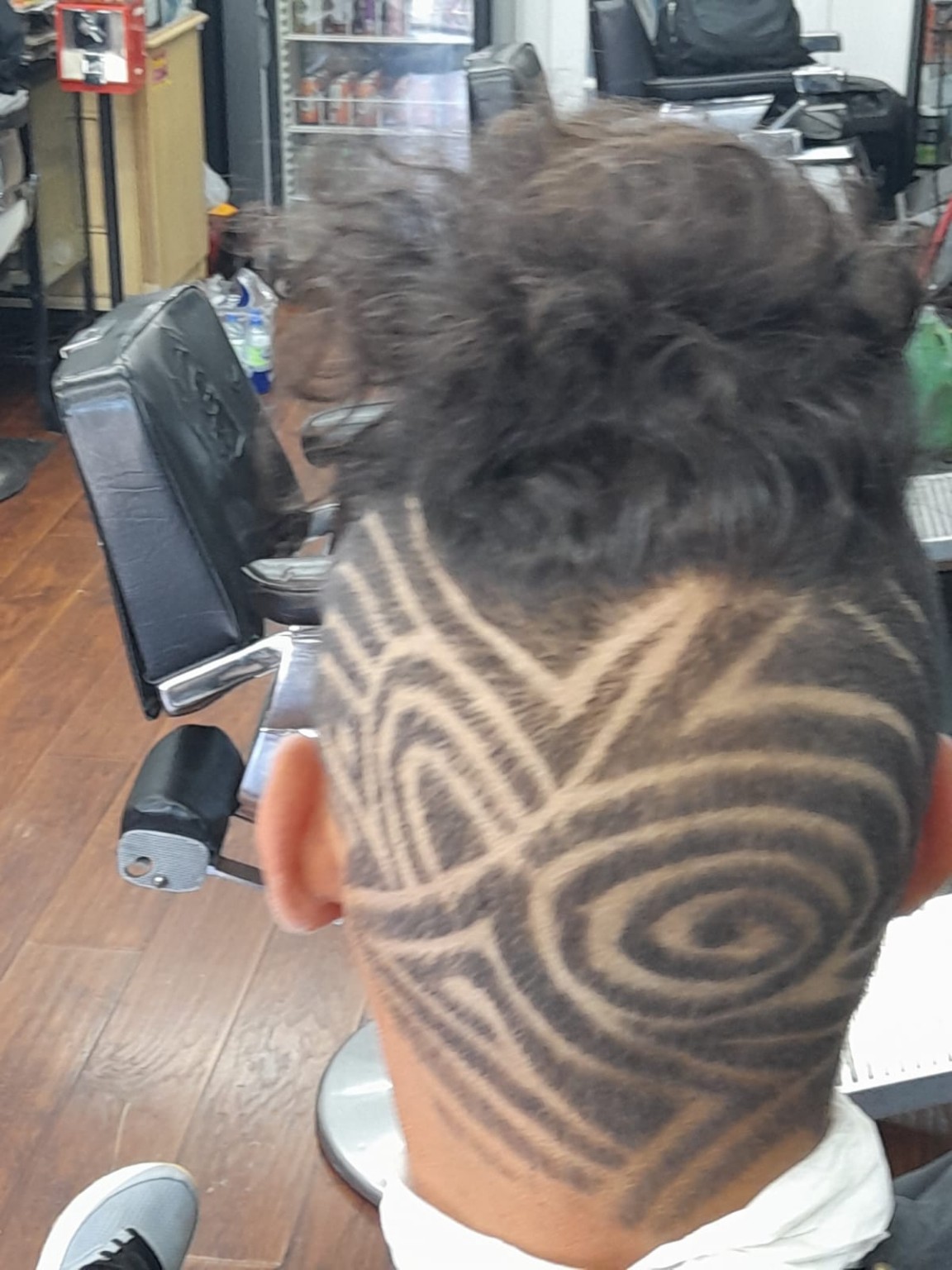 K. Stylz haircut design — rear view